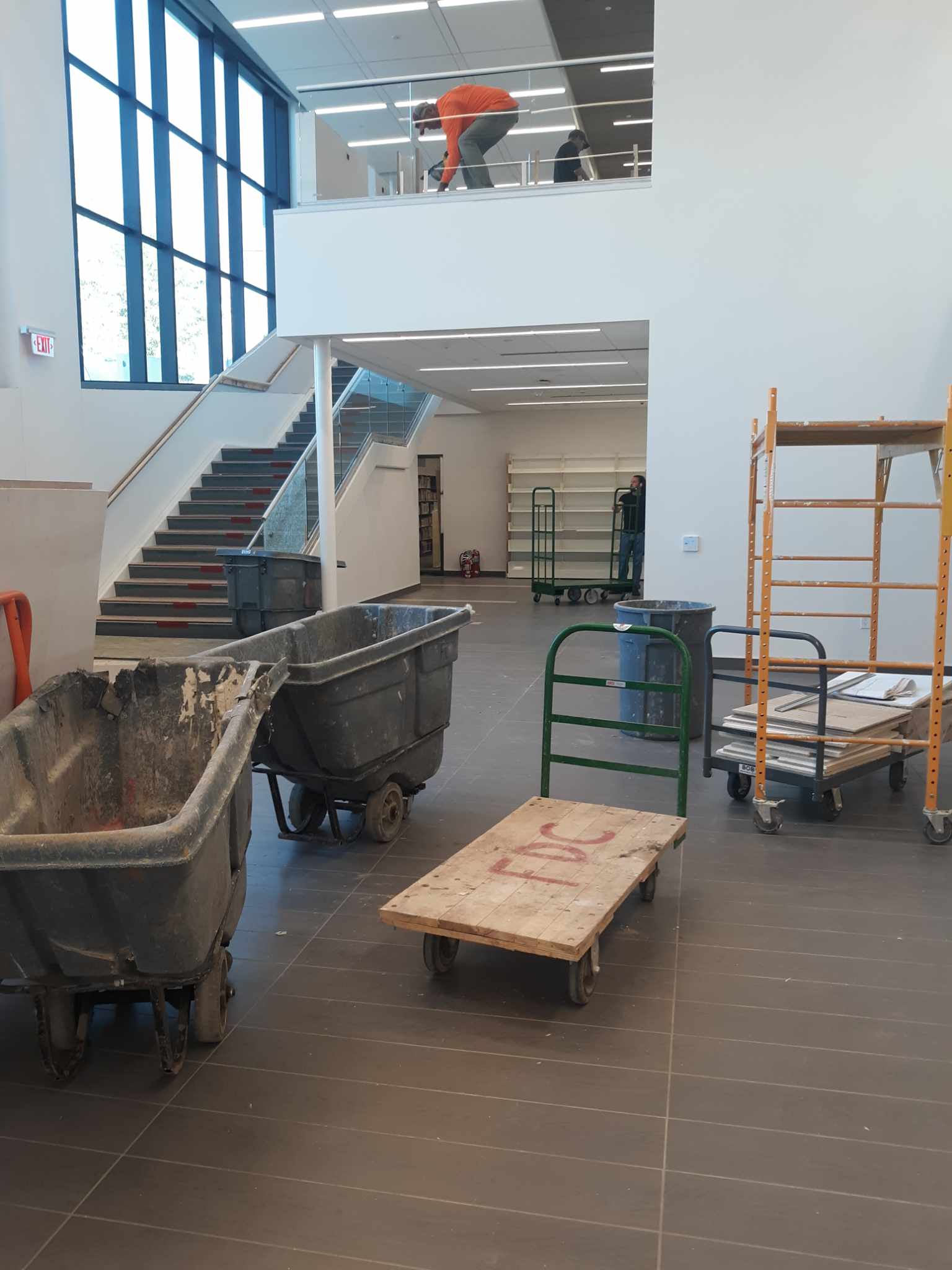 Construction happening on the first floor near the stairs and elevator.