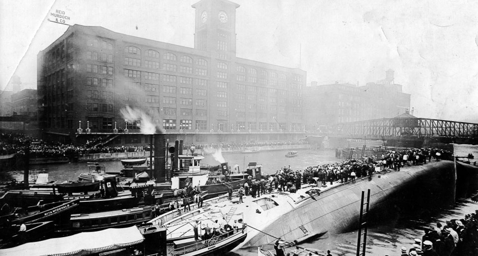 Image of the overturned boat, SS Eastland, in the Chicago River 