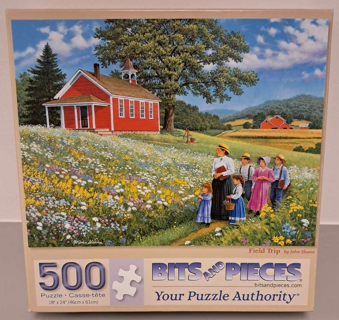 Puzzle cover with an artistic drawing of a teacher and group of children walking through a field near a red barn.