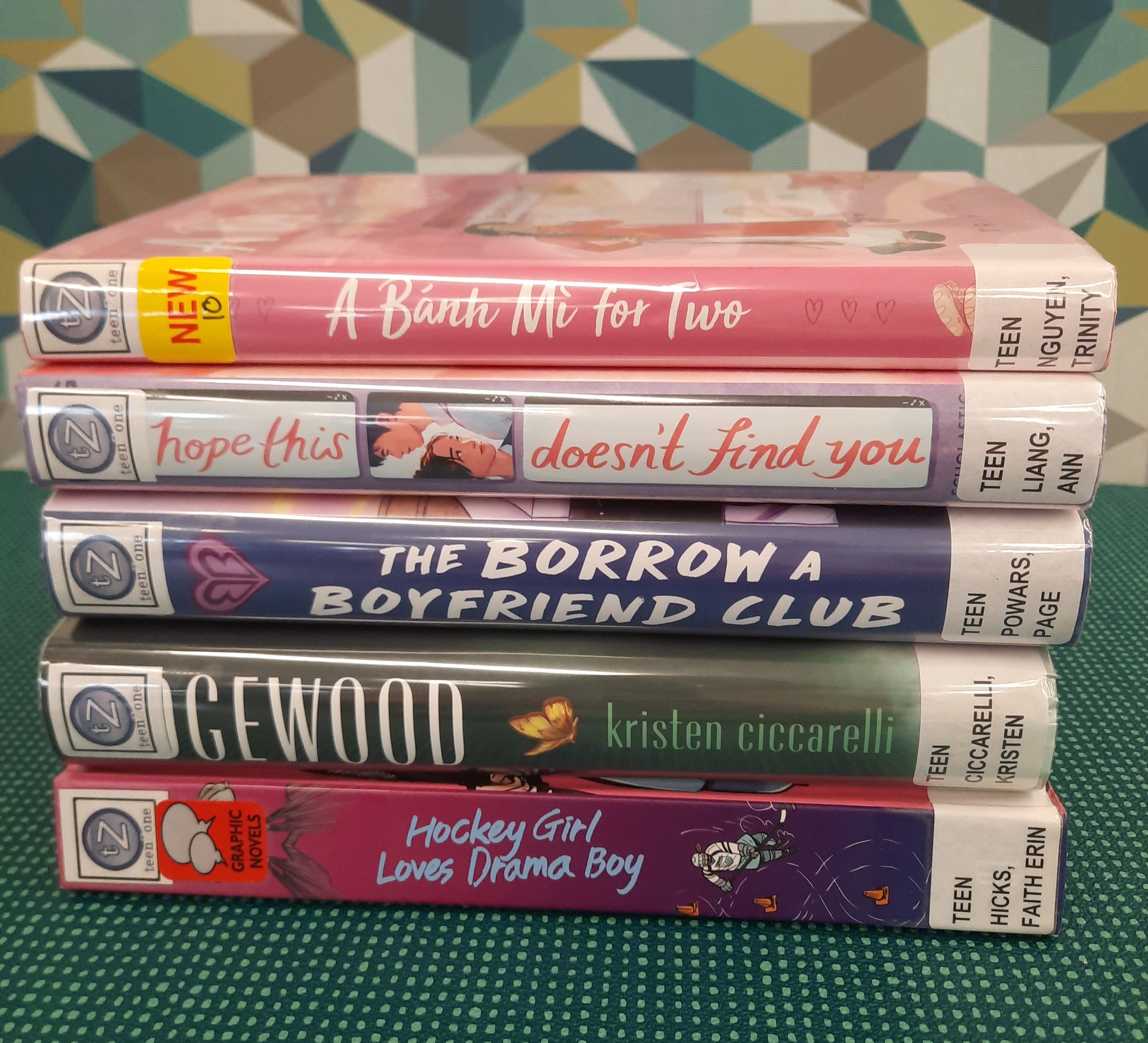 2025 August Book Stack Book stack showing the following titles: "A Banth Mi for Two," "I Hope this doesn't find you," "The Borrow a Boyfriend club," "Edgewood," and "Hockey Girl Loves Drama Boy"