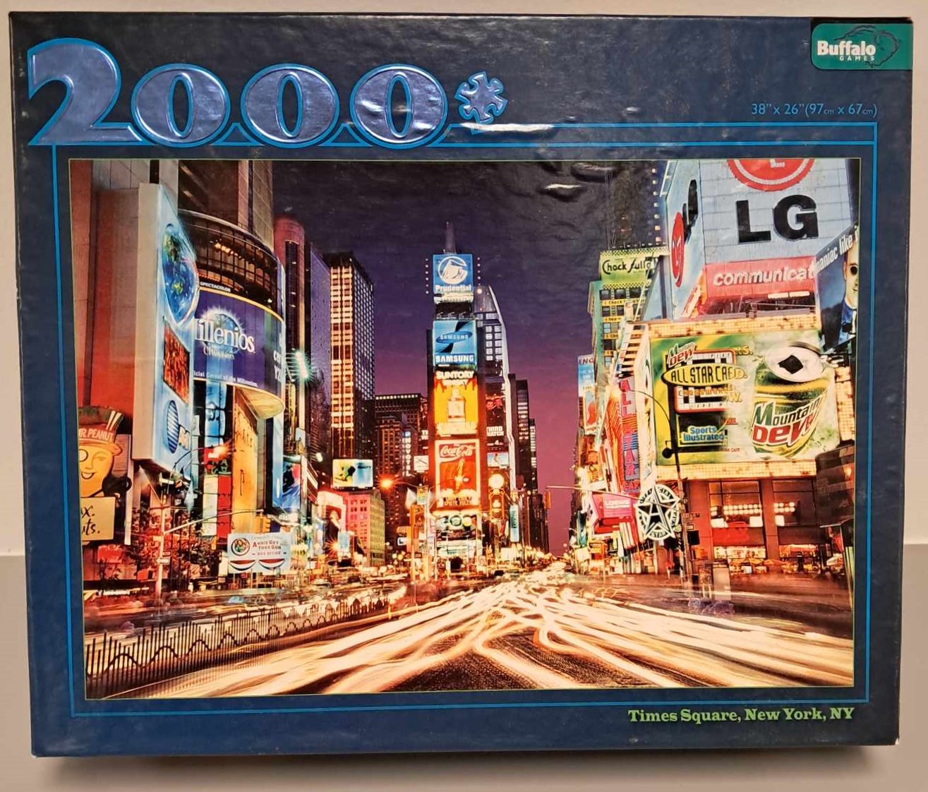 Puzzle cover showing an image of Times Square in New York.