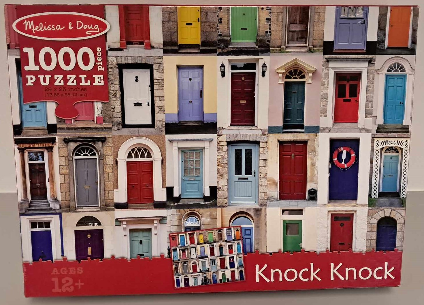 Puzzle cover showing a collage of different front doors in many different colors and styles.