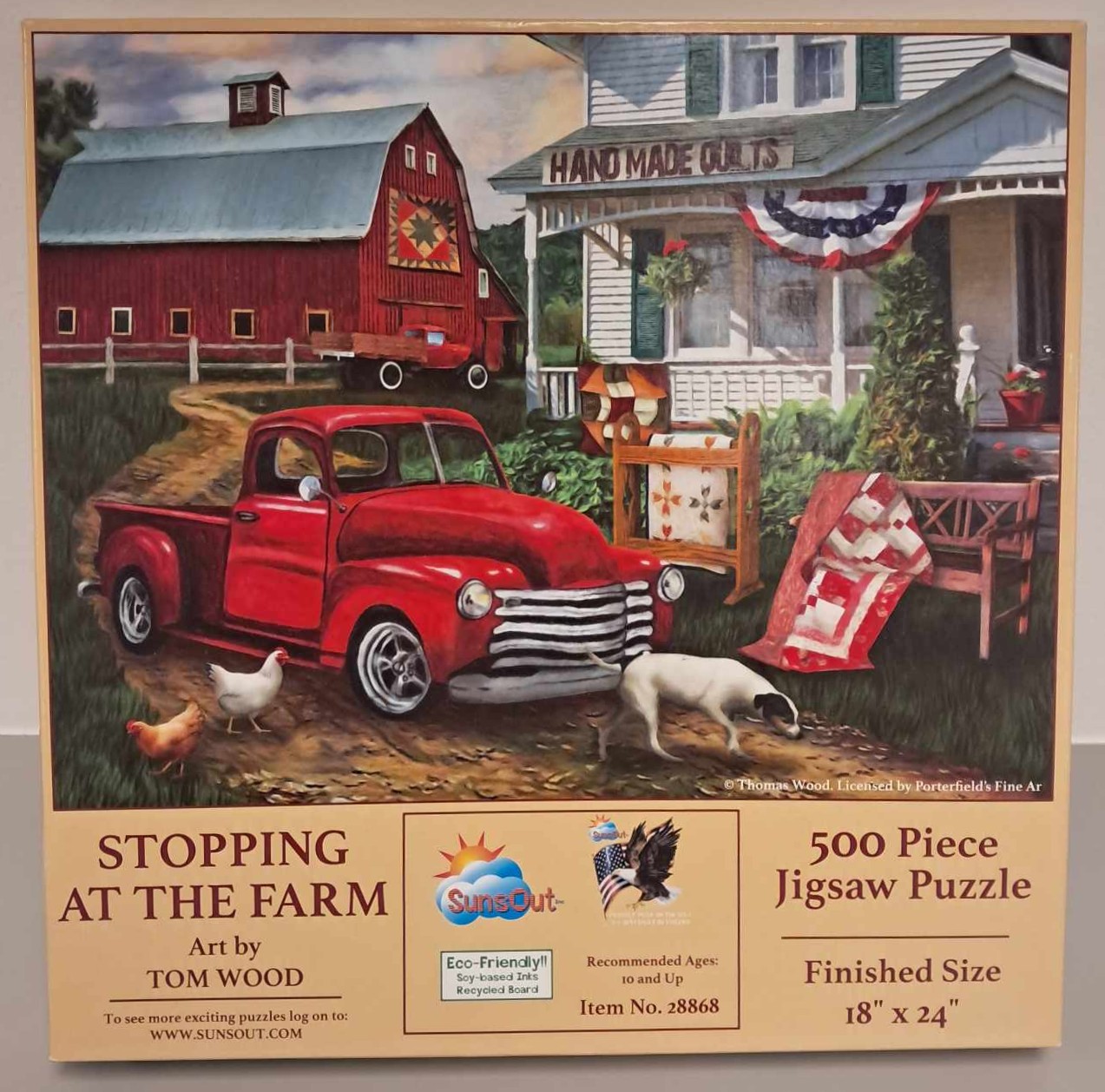 Puzzle cover showing an image of a red truck in front of a barn and house. There are chickens and a dog on the road.