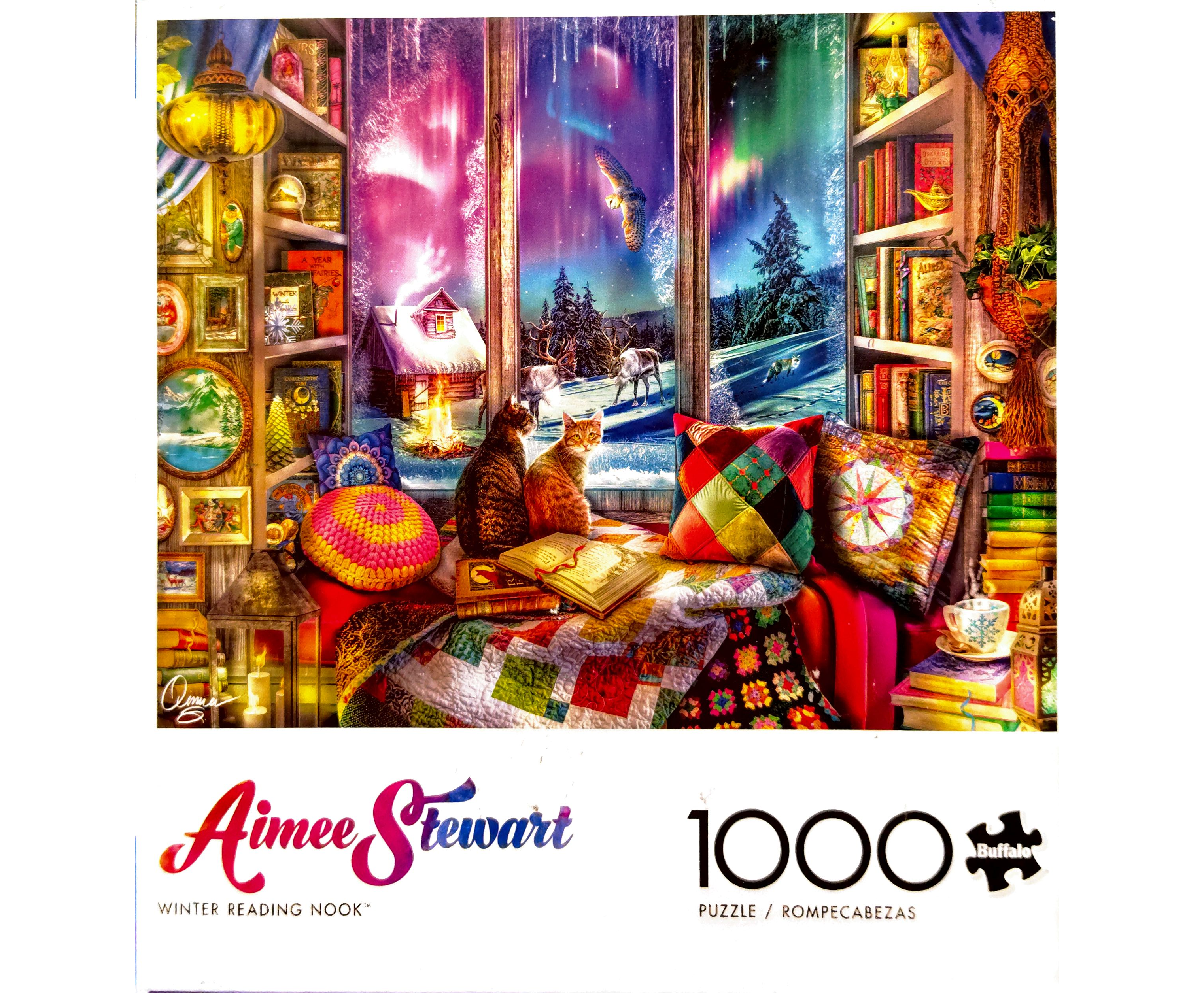 Puzzle cover showing two cats sitting on a window ledge with pillows and bookshelves looking outside at an aurora borealis sky during winter.