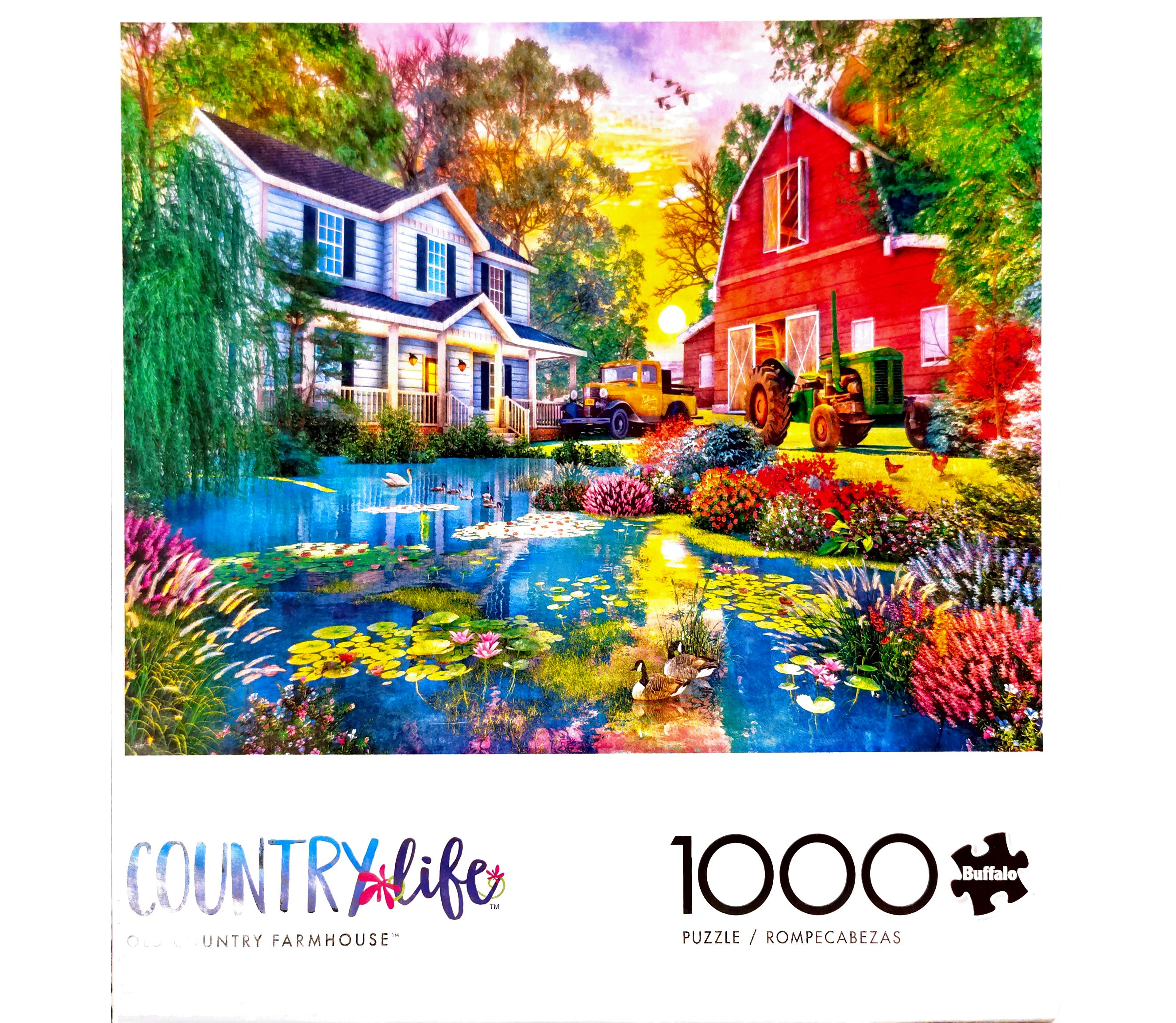 Puzzle cover showing a house and a red barn sitting on a lake with lots of flowers.