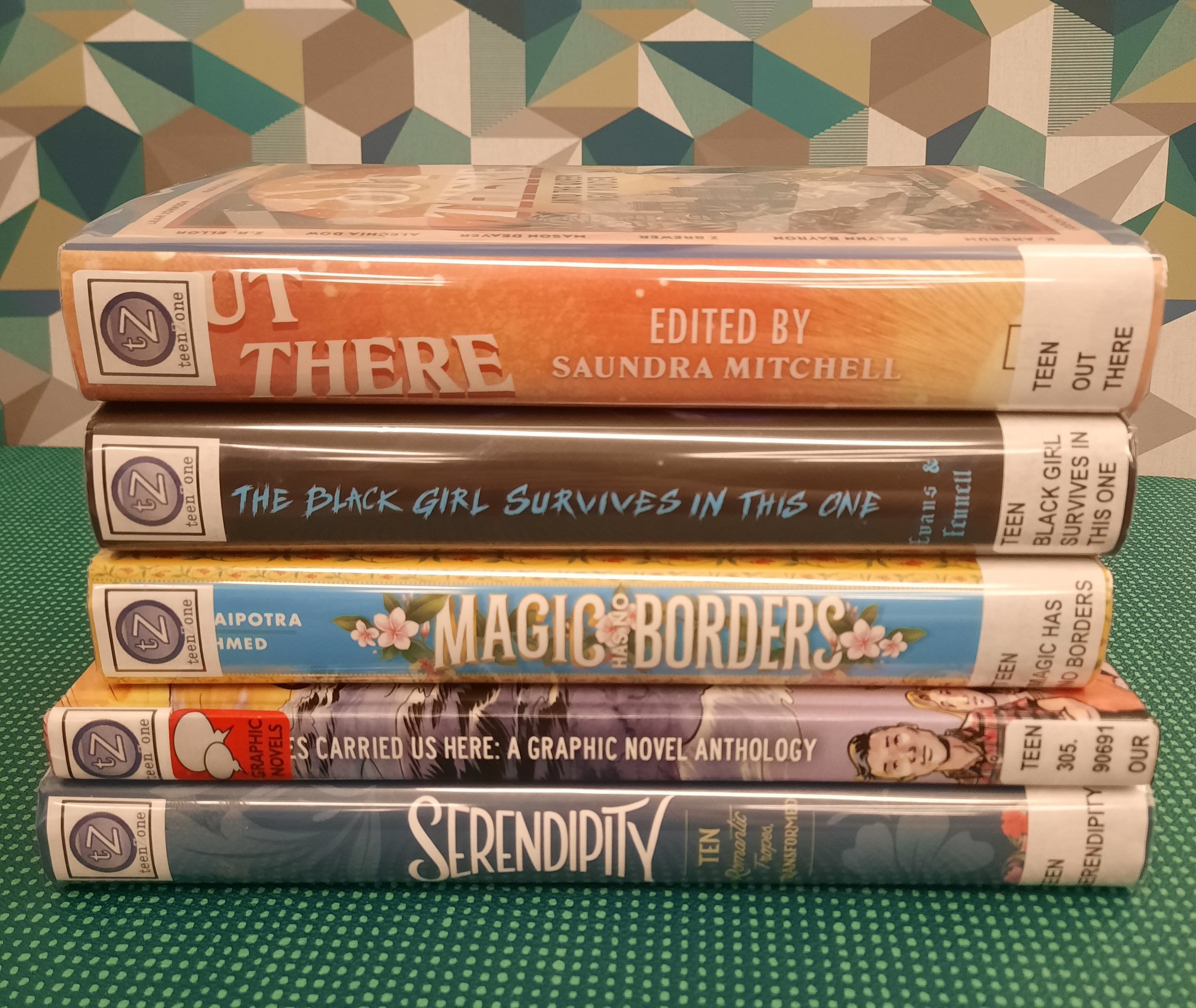 Stack of books that fit the theme of Short Story Collections