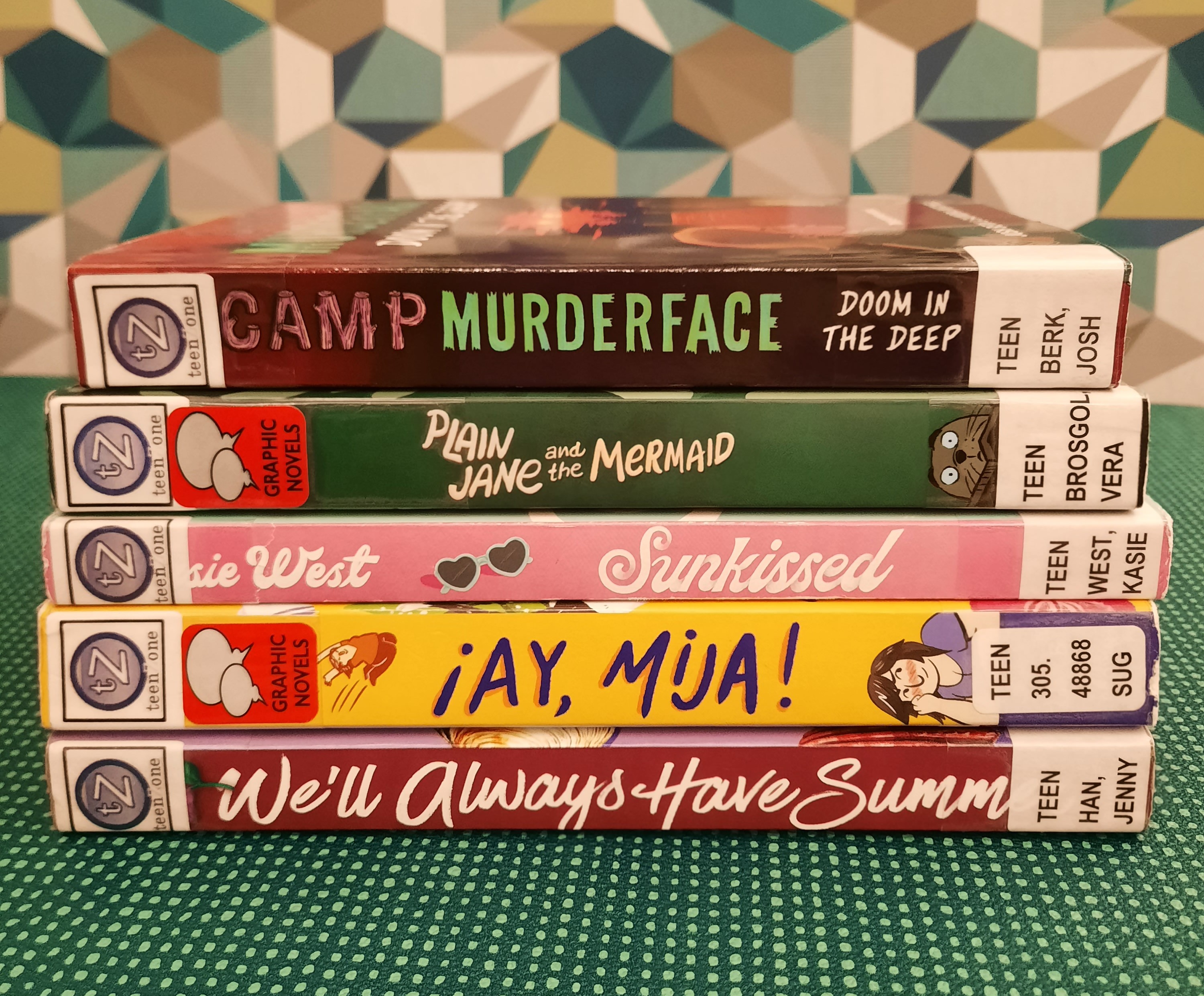 Stack of books that fit the theme of Summer Vacation