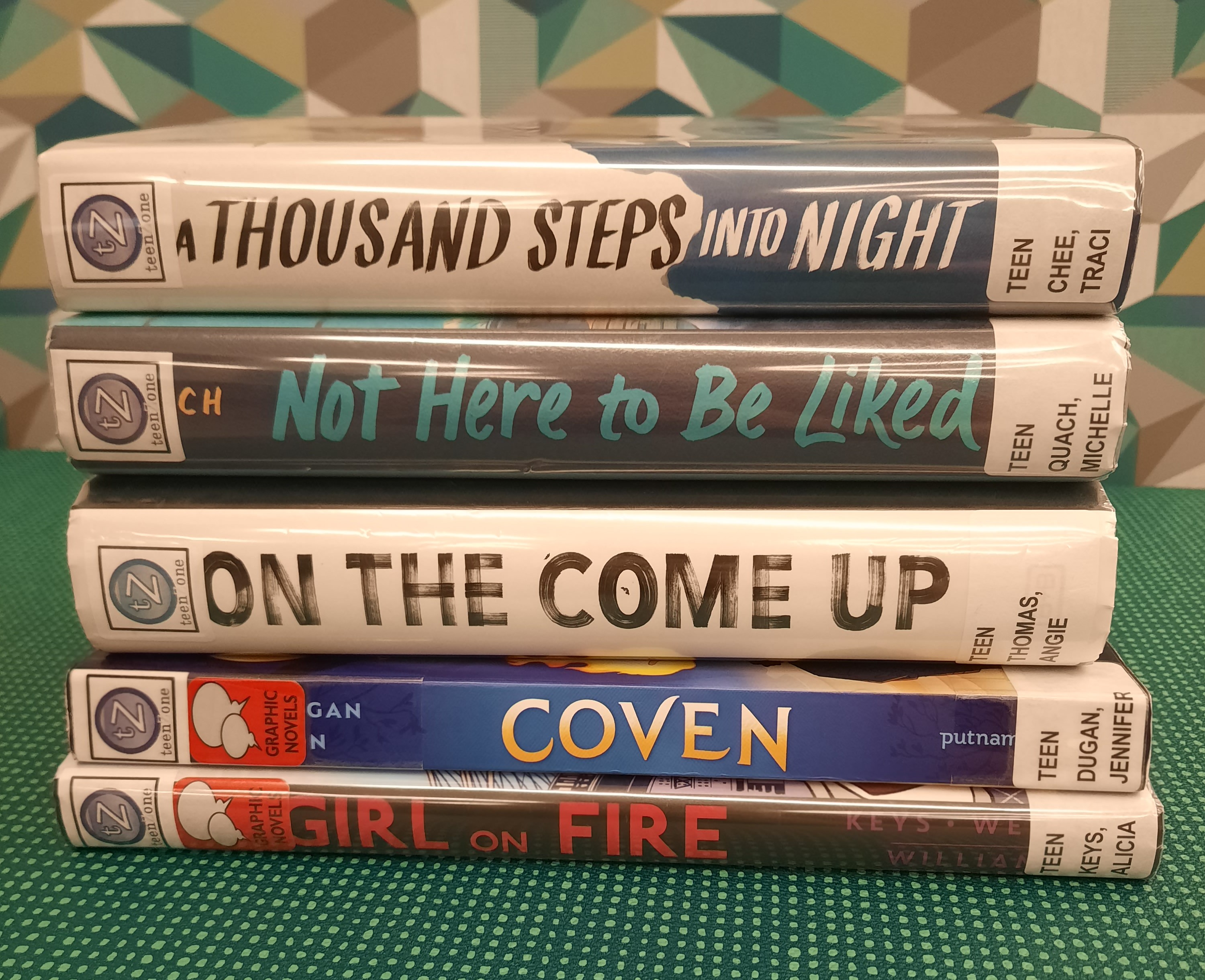 Stack of books that fit the theme of Powerful Women