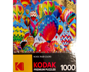 Puzzle Cover showing a variety of hot air balloons in a lot of different colors and designs.