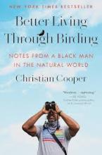 Cover of the book Better Living Through Birding by Christian Cooper. A Black man looks up at the sky through a pair of binoculars. 
